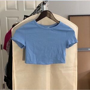 Baby blue crop top 
Size s